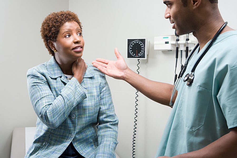 woman talking to doctor about pelvic congestion syndrome