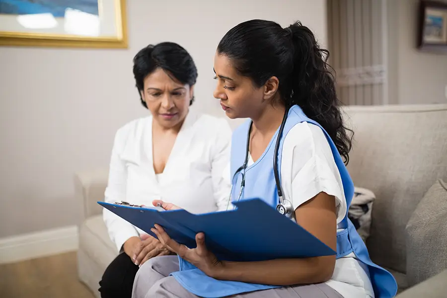 nurse discussing ufe recovery timeline with patient